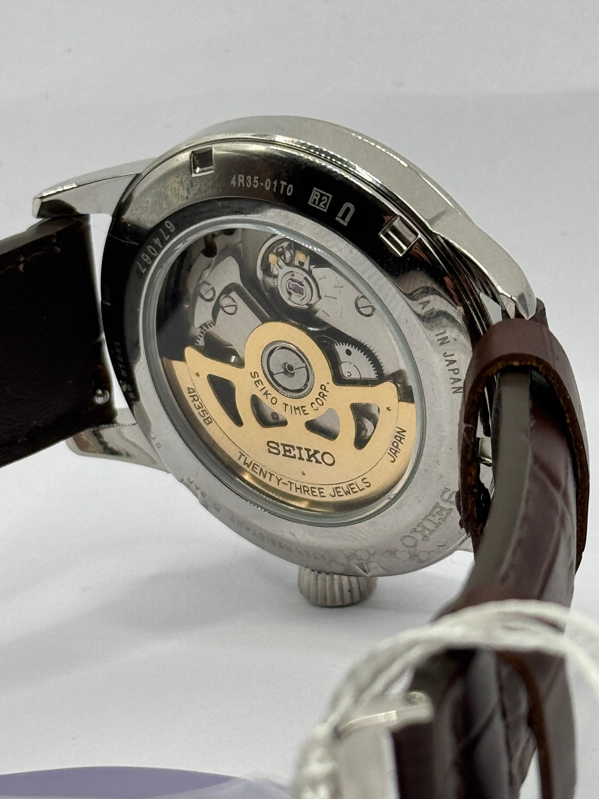 Seiko Presage Midnight Blue Moon SRPK15J1, exhibition caseback showing the 4R35 movement