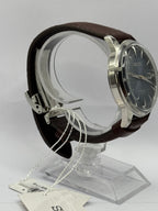 Seiko Presage Midnight Blue Moon SRPK15J1, case side with brown leather strap