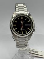 Seiko 5 Sports SNXS SRPK89K1, black dial and steel bracelet on stand