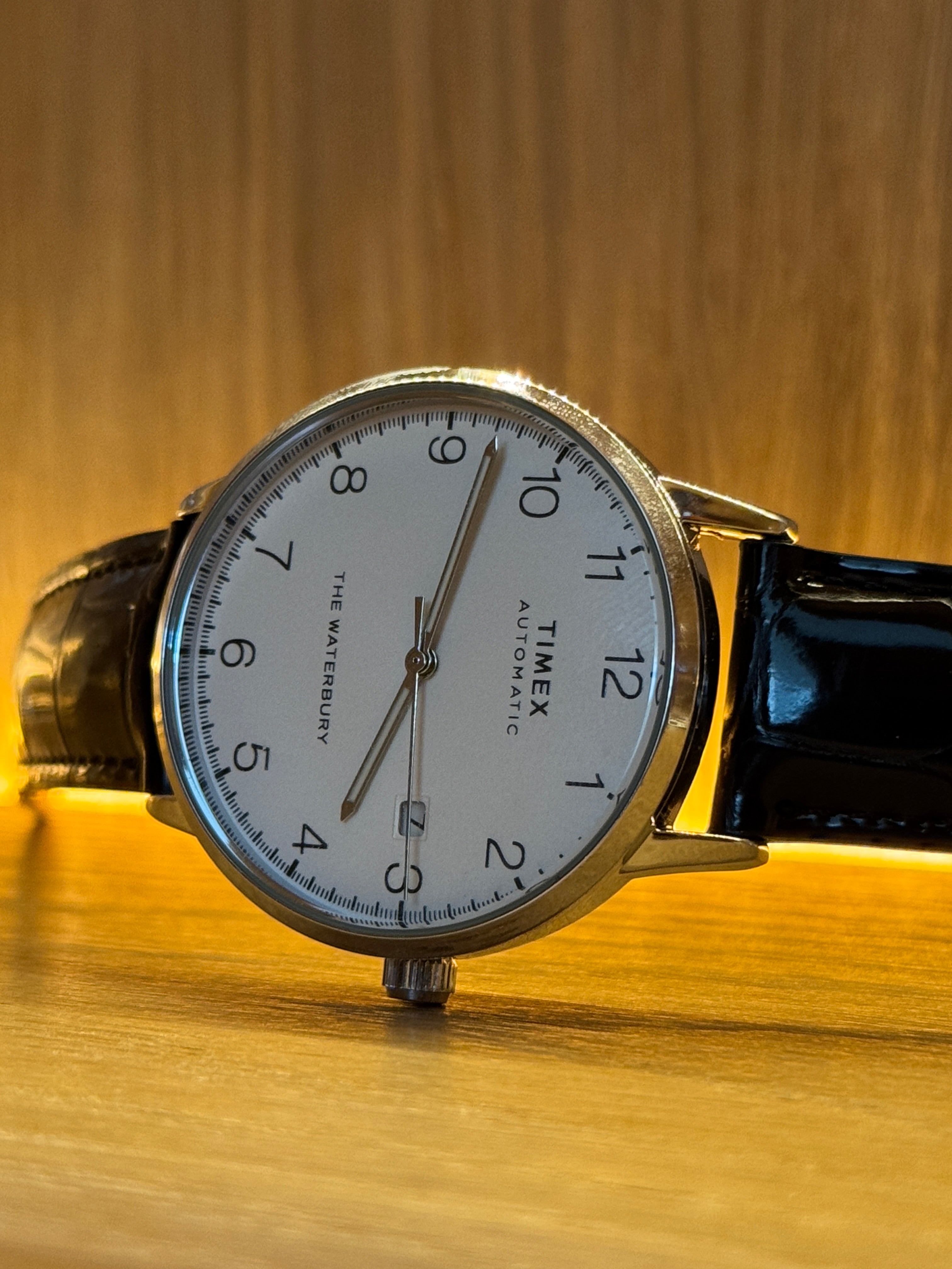 Timex Waterbury Automatic, white dial with blue seconds marker and black leather strap - front view