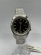 Seiko 5 Sports SNXS SRPK89K1, black dial front view with swing tag