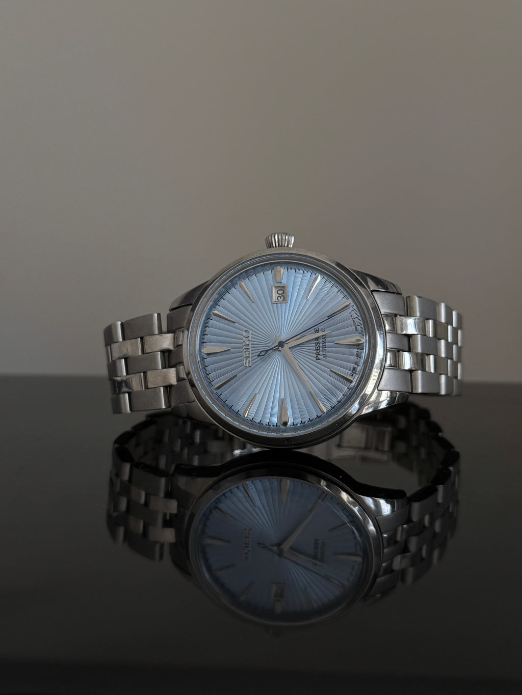 Seiko Presage 'Skydiving' SSK037J1 — ice blue sunburst dial, stainless steel bracelet, front view