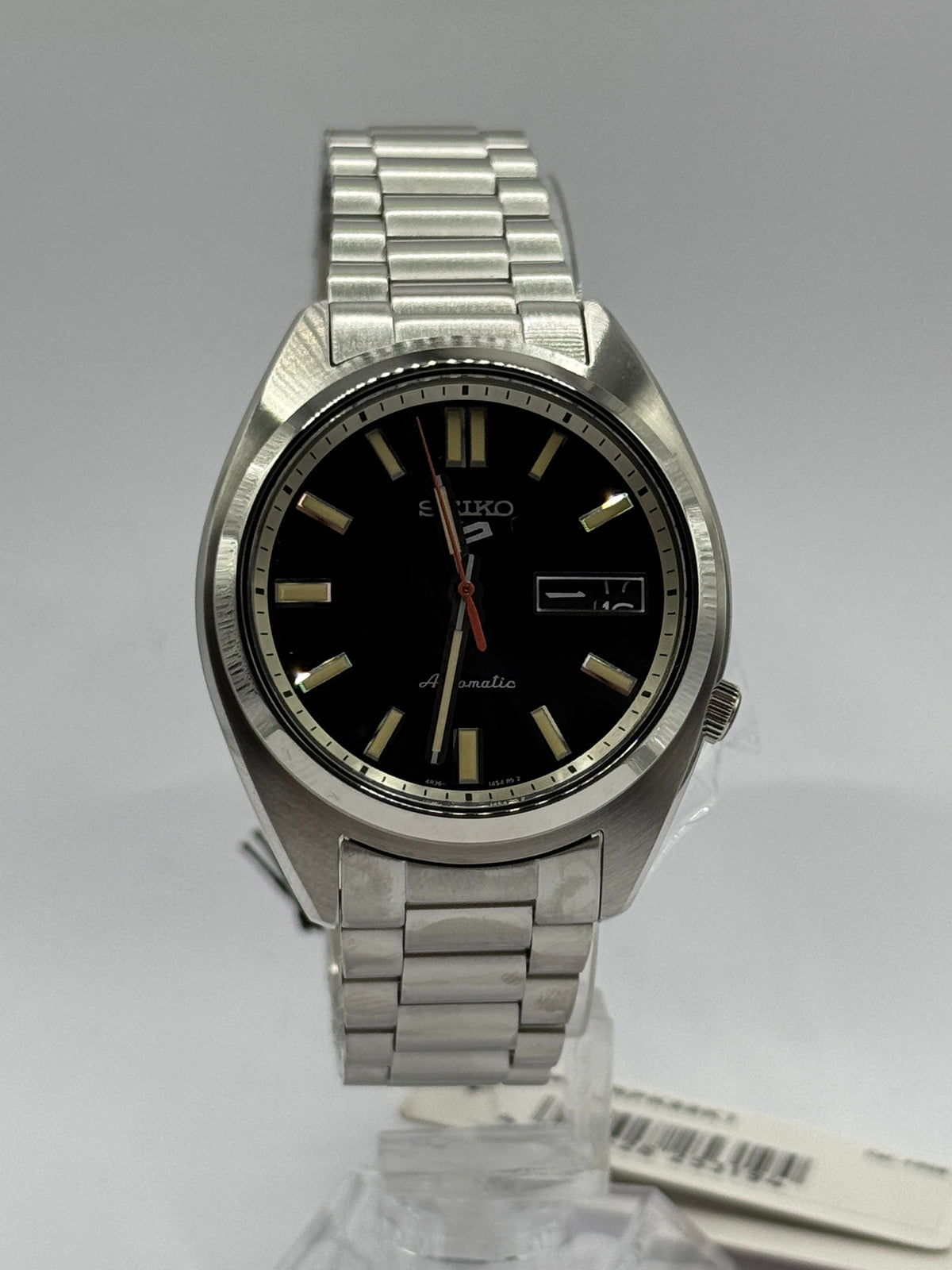 Seiko 5 Sports SNXS SRPK89K1, black sunburst dial and steel bracelet - front view