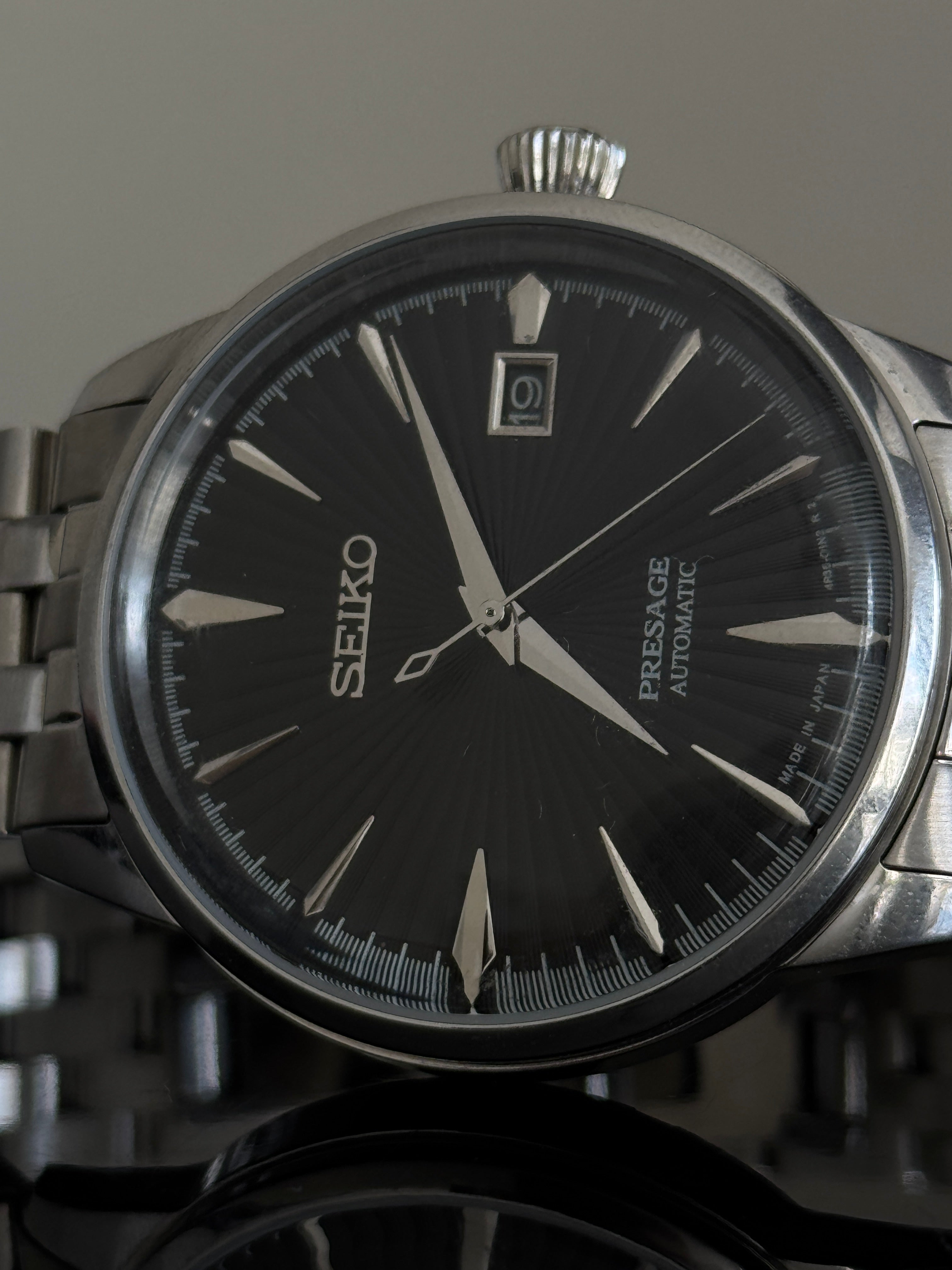 Seiko Presage Cocktail Time SRPE17J1 — black dial detail with applied indices