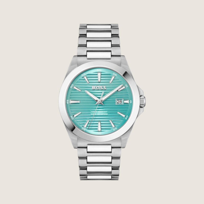 Hugo BOSS Strike with ice blue horizontal-lined dial, date window and stainless steel bracelet, on a plain bone background