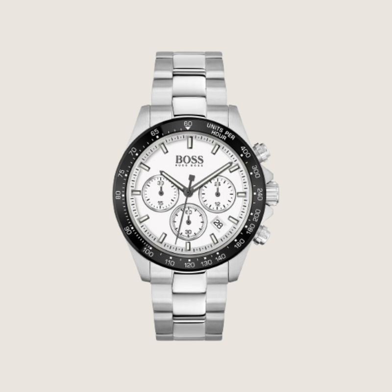 Hugo BOSS Ikon Chronograph with panda dial and black tachymeter bezel on a steel bracelet, on a plain bone background