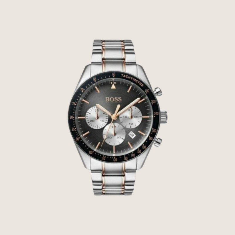 Hugo BOSS Trophy chronograph with charcoal dial, rose gold hands and two-tone steel and rose gold bracelet, on a plain bone background