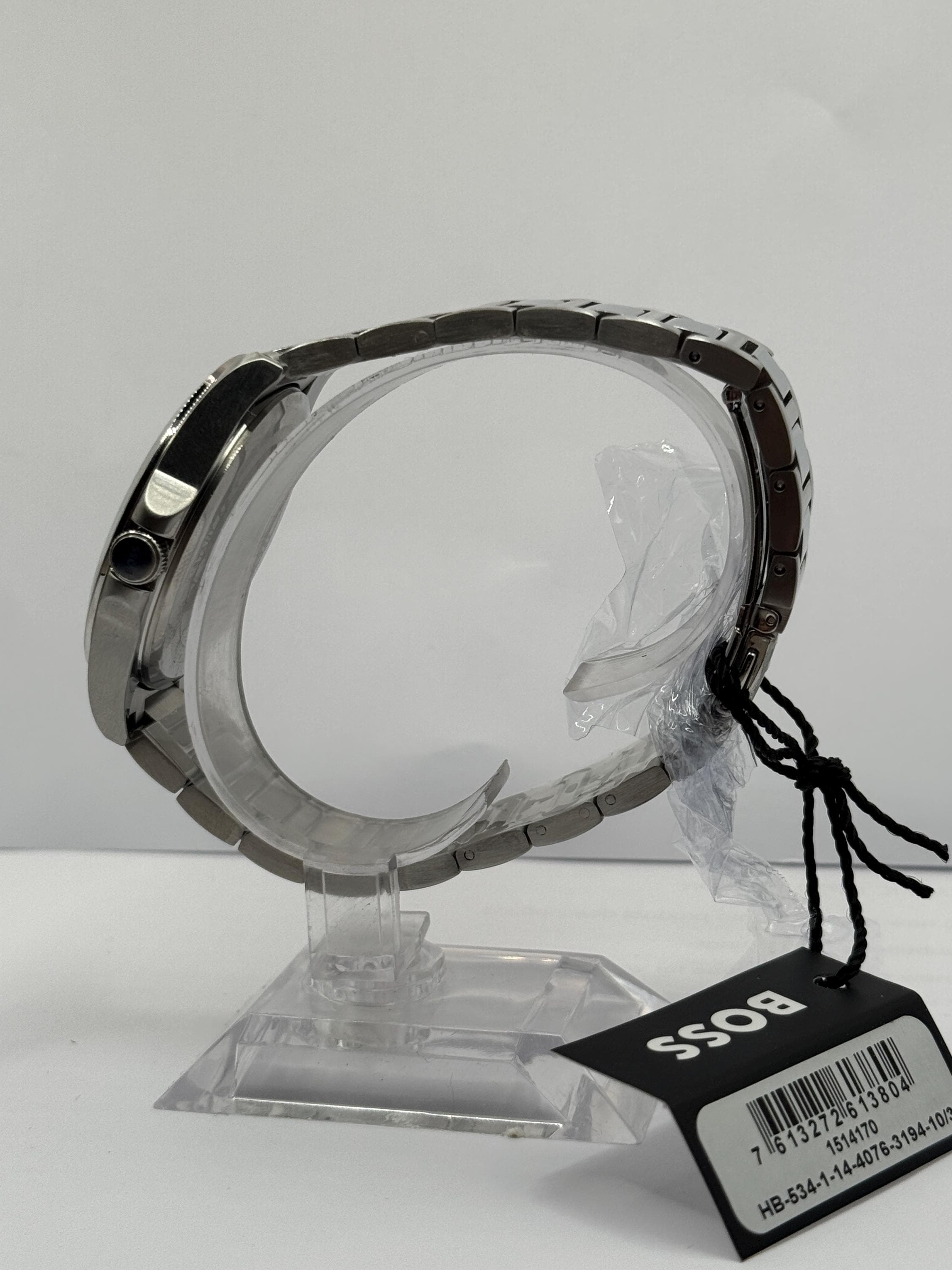 Black dial chronograph on wrist